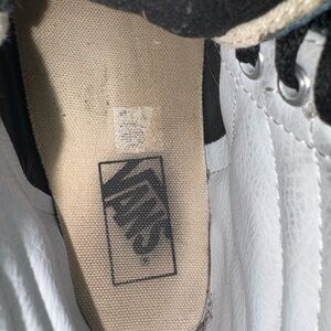 Vans Black and White High-Top Sneakers